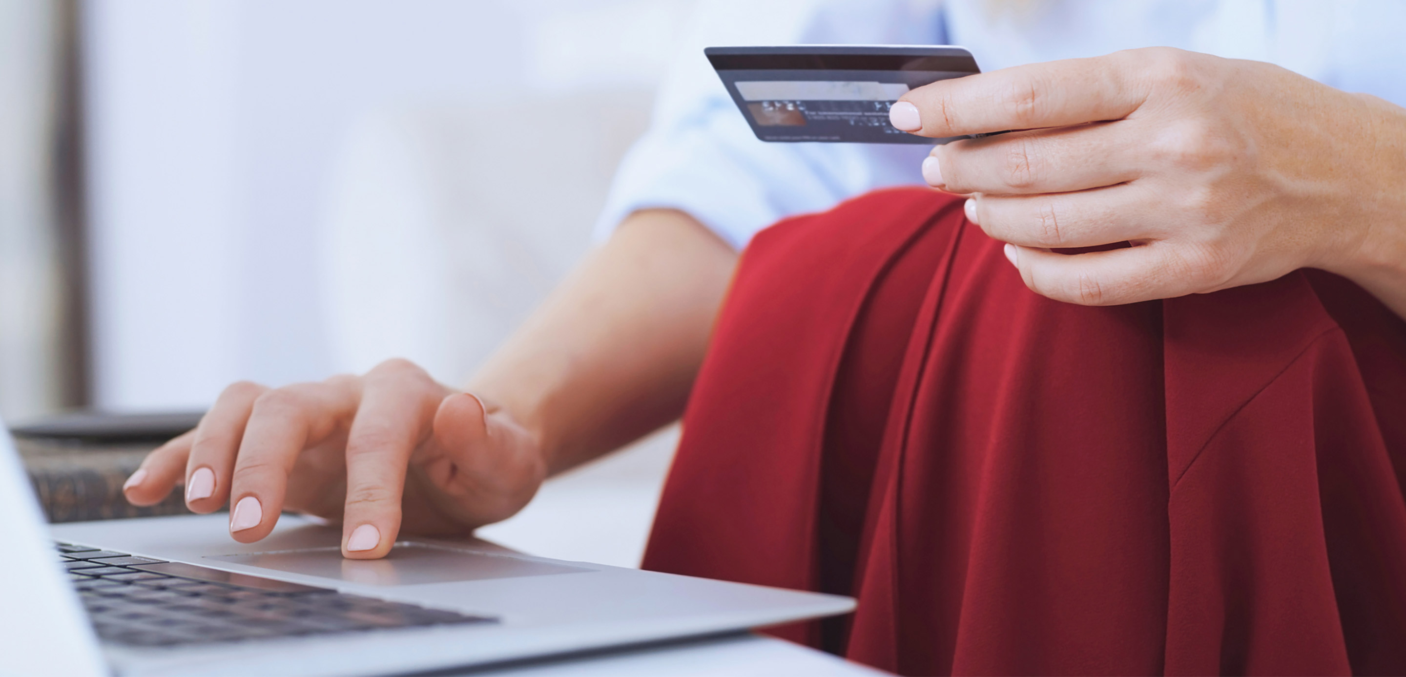 Woman making an online purchase on a laptop