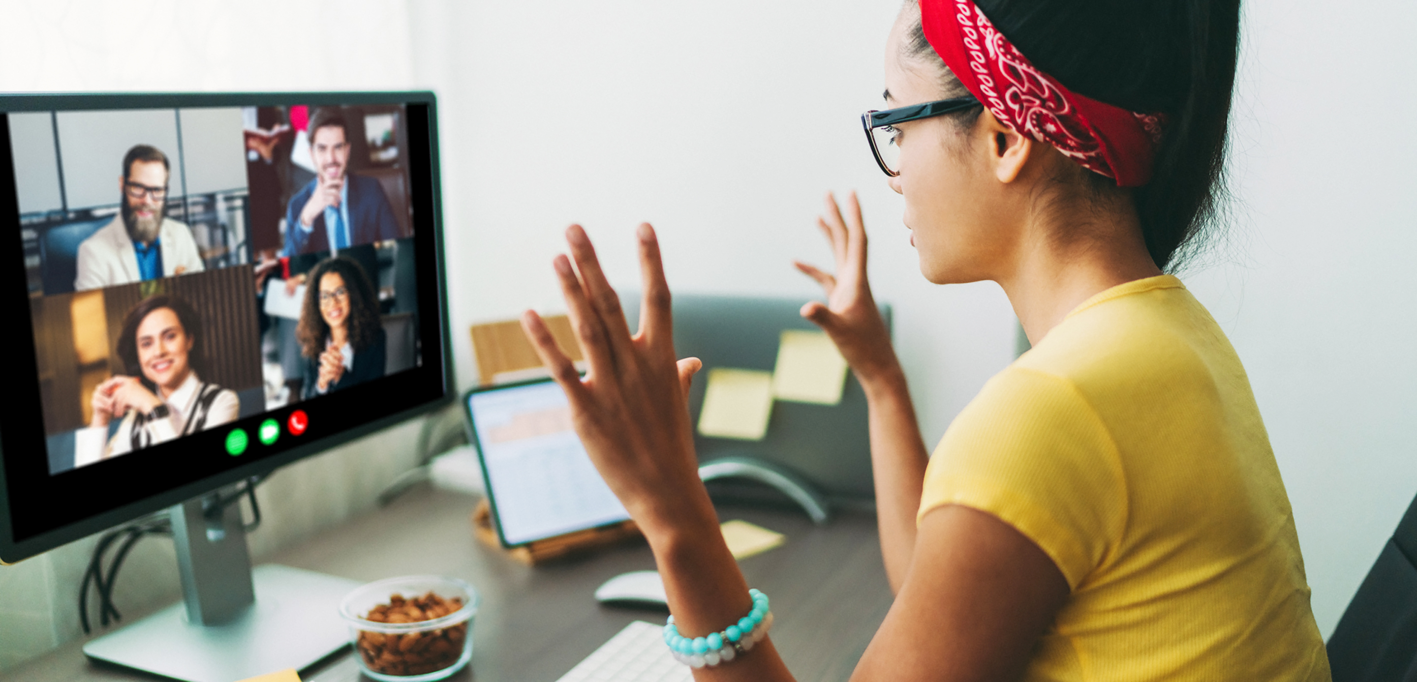 Woman at desktop computer on video call Woman at desktop computer on video call
